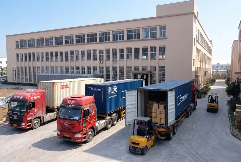 Standardized containers being loaded for outbound shipment